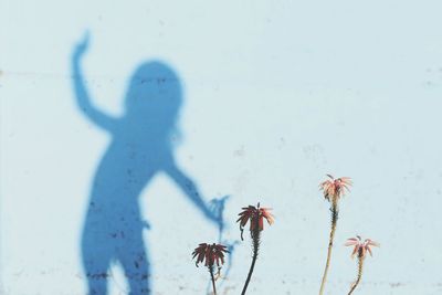 Woman standing in pond