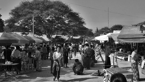 People on street market in city