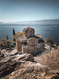 Panoramic view of sea and building against sky