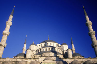 Low angle view of building against blue sky