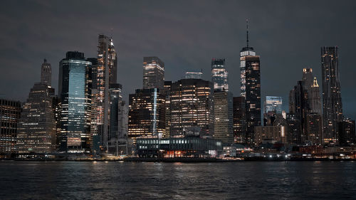 Illuminated buildings in city at night,new york skyline at night