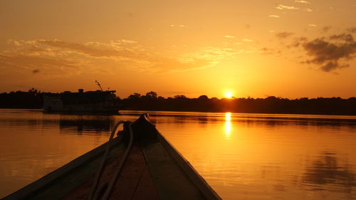 Scenic view of river during sunset