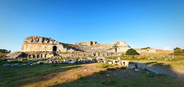 Old ruins against blue sky