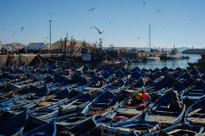 View of fishing boats in harbor