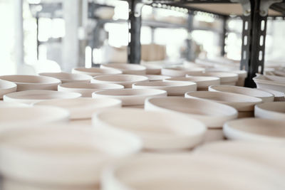 Close-up of white candles on table