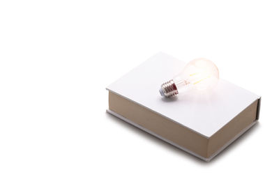 High angle view of book on white background