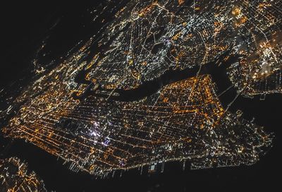 Low angle view of illuminated lights at night