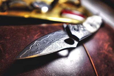 Close-up of machine on table