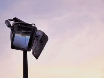 Low angle view of street light against sky