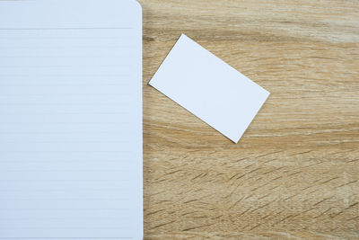 Close-up of white paper on table